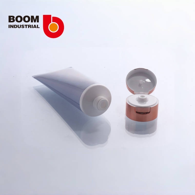 35mm diameter tube with offset printing + hot stamping and electroplated rose gold-colored flip cap