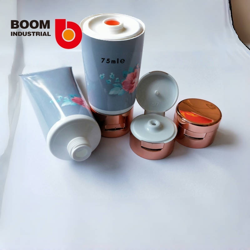 35mm diameter tube with offset printing + hot stamping and electroplated rose gold-colored flip cap