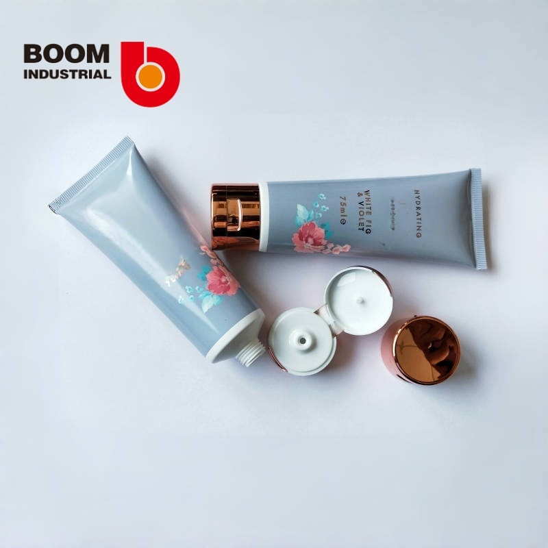 35mm diameter tube with offset printing + hot stamping and electroplated rose gold-colored flip cap